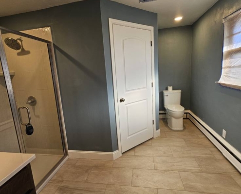 Cabinetry, Countertops & Shower by Mozaks