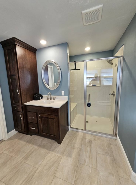 Cabinetry, Countertops & Shower by Mozaks